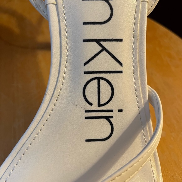 Calvin Klein Millie Ankle Strap Sandal in White. - Picture 12 of 15